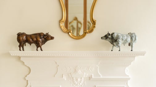 Bronze sculptures on a mantlepiece